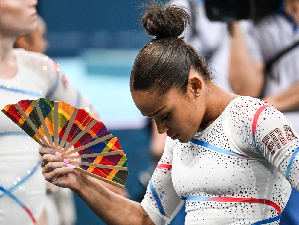 加拿大体操选手高难度动作斩获金牌